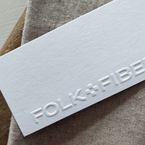 Logo van Folk+fiber stoffenwinkel in Haarlem